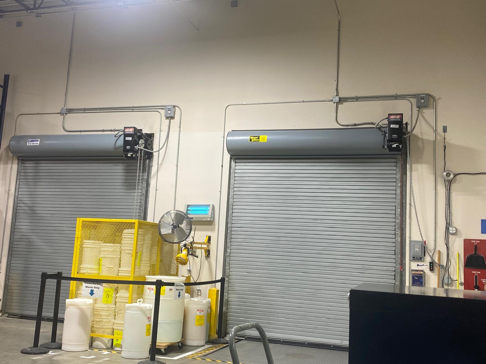 Electrical conduit and connections above commercial overhead doors